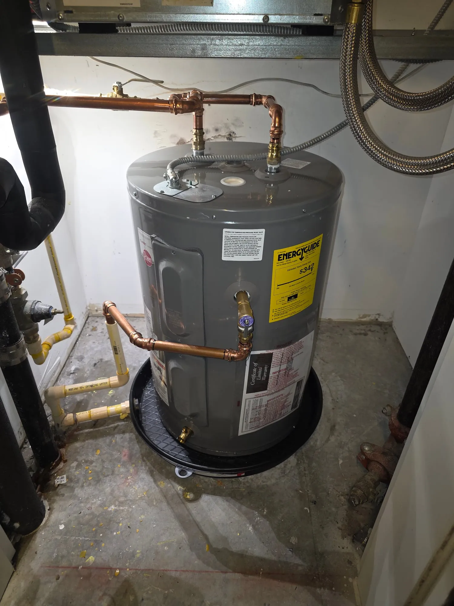 Replacement electric water heater in a condo mechanical closet with copper piping